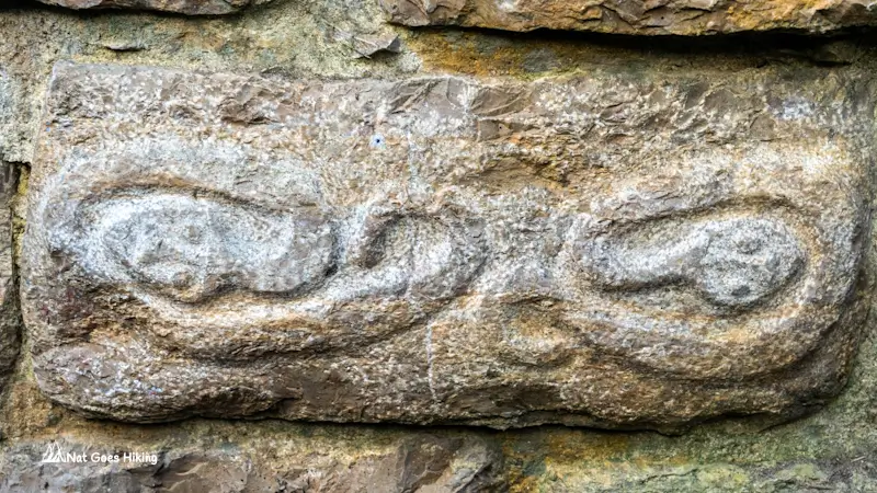 Stone carving of two serpents at Kuelap