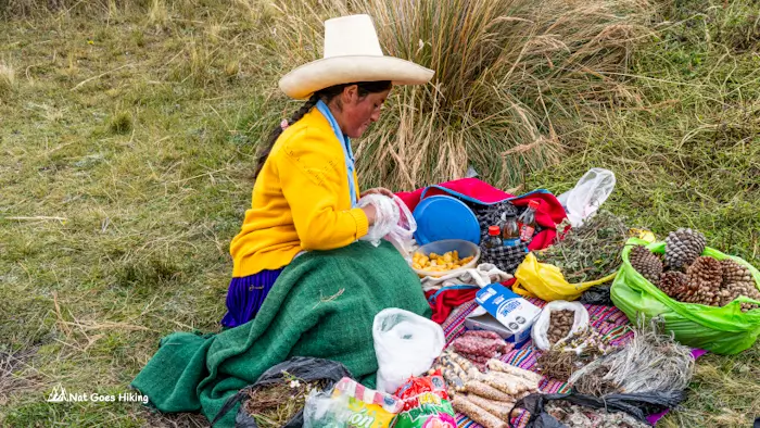 Cumbe Mayo - Local lady selling snacks and herbs