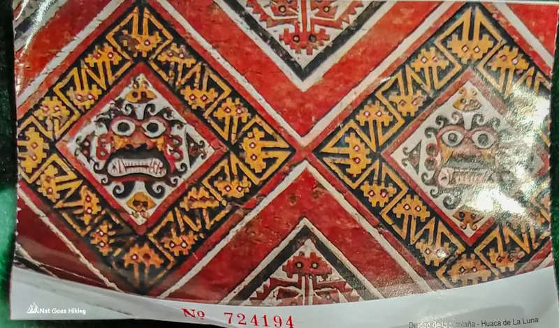 Ticket stub for Huaca de la Luna with a red, yellow and black diamond pattern echoing the Patio de los Rombos motifs
