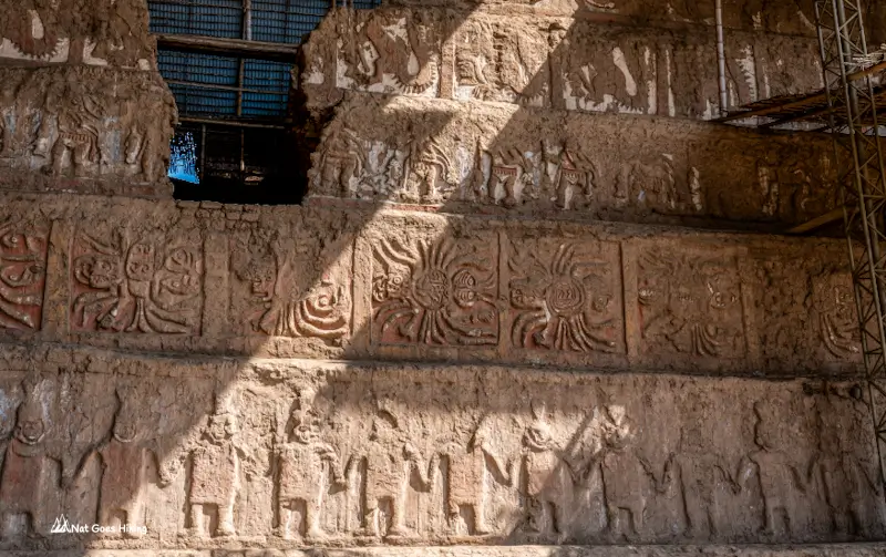 Section of Huaca de la Luna's north façade showing tiered Moche reliefs, Peru
