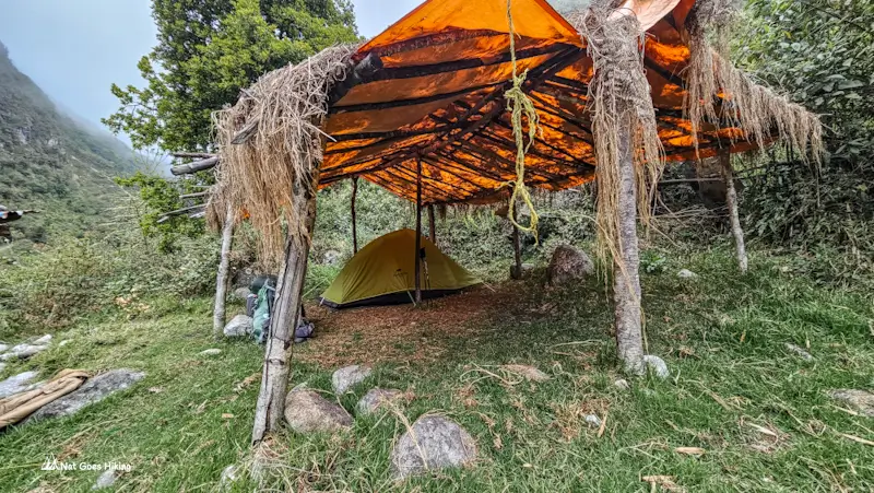 tent pitched under a shelter at Challapampa campsite on the El Choro Trek